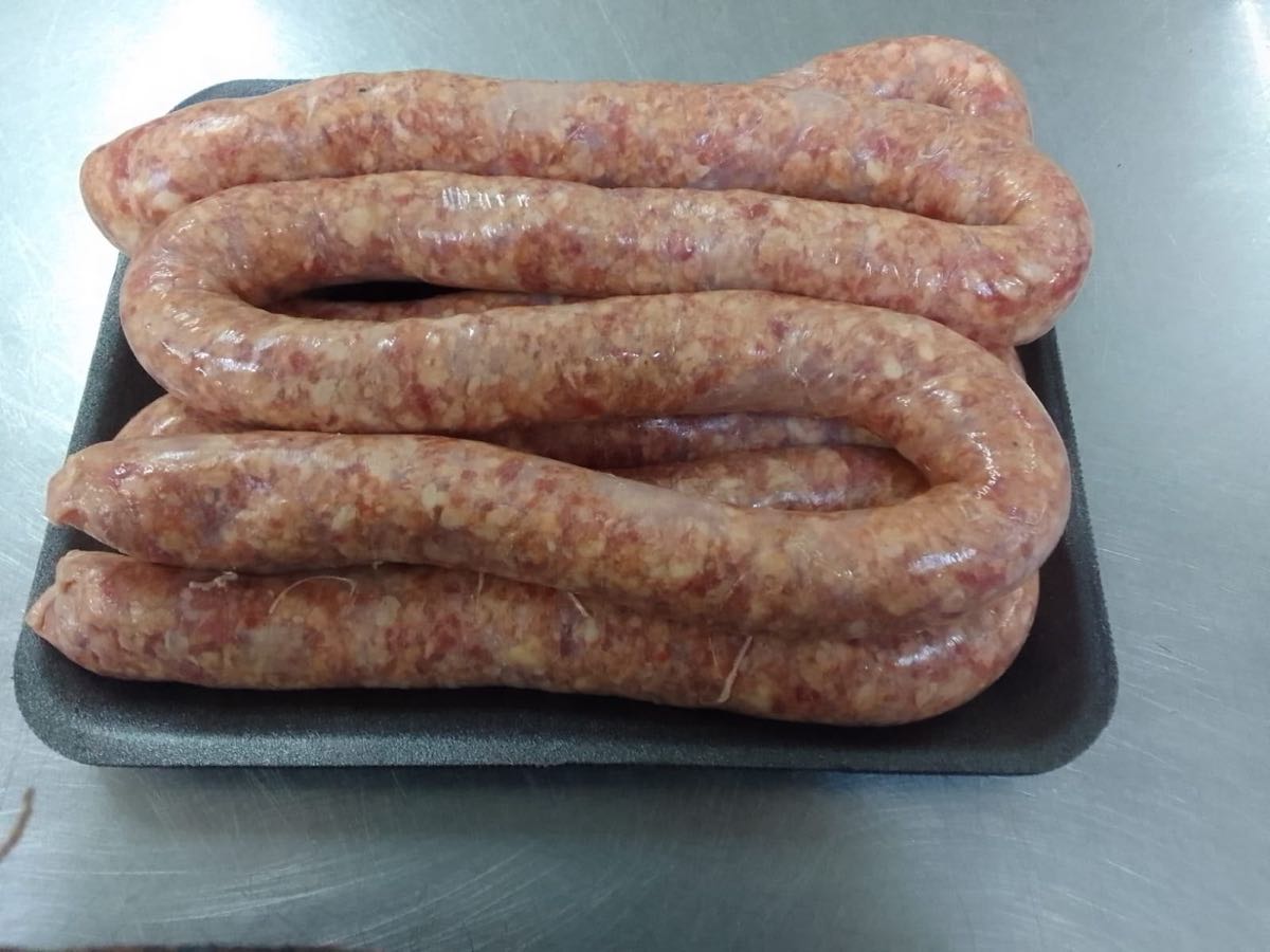 Coils of fresh boerewors on a tray